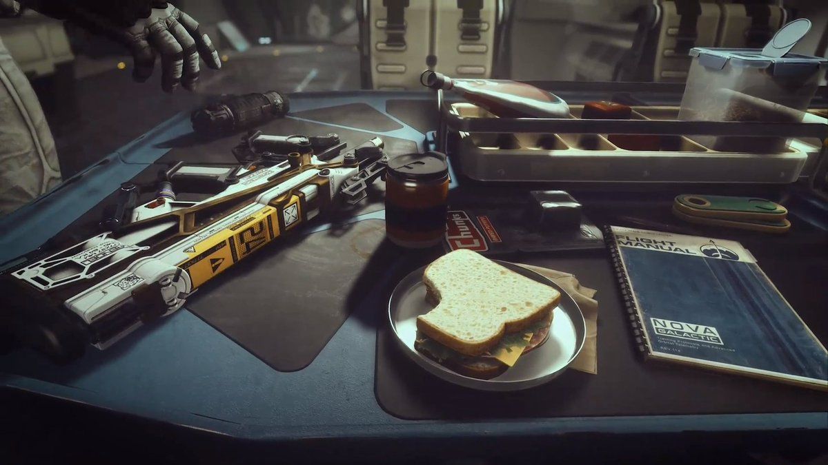 Screenshot for Starfield. it's a sandwich next to guns on a tooltable.