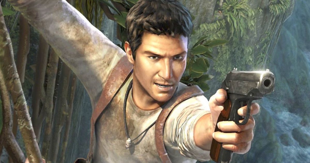 Nathan Drake holding onto a cliff and aiming a pistol at the camera 