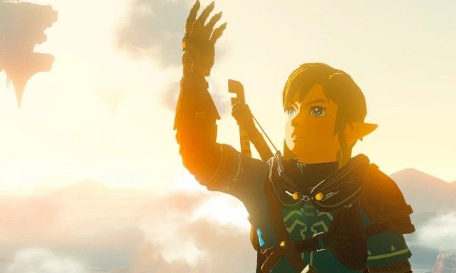Screenshot of Link in Zelda Tears of the Kingdom holding hand in the air