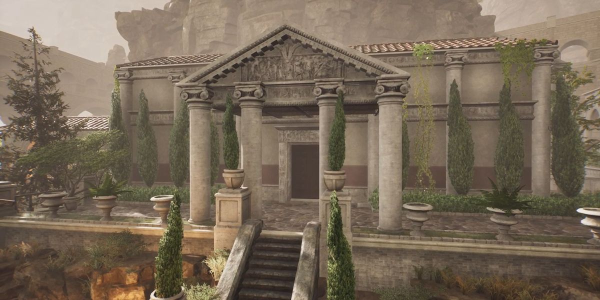 The Forgotten City. Malleolus's Villa from the outside. The villa is a grand building with columns and large above the front door with carvings engraved in the roof. There are steps leading up to the main door and trees.