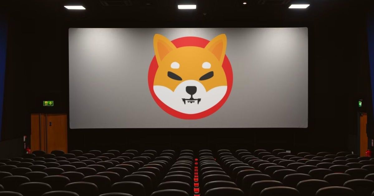 Cinema screen with Shiba Inu (SHIB) logo on the screen.