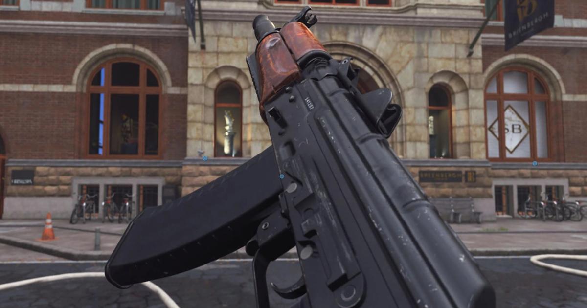 Modern Warfare 3 Kastov 74u assault rifle on its side with building in background