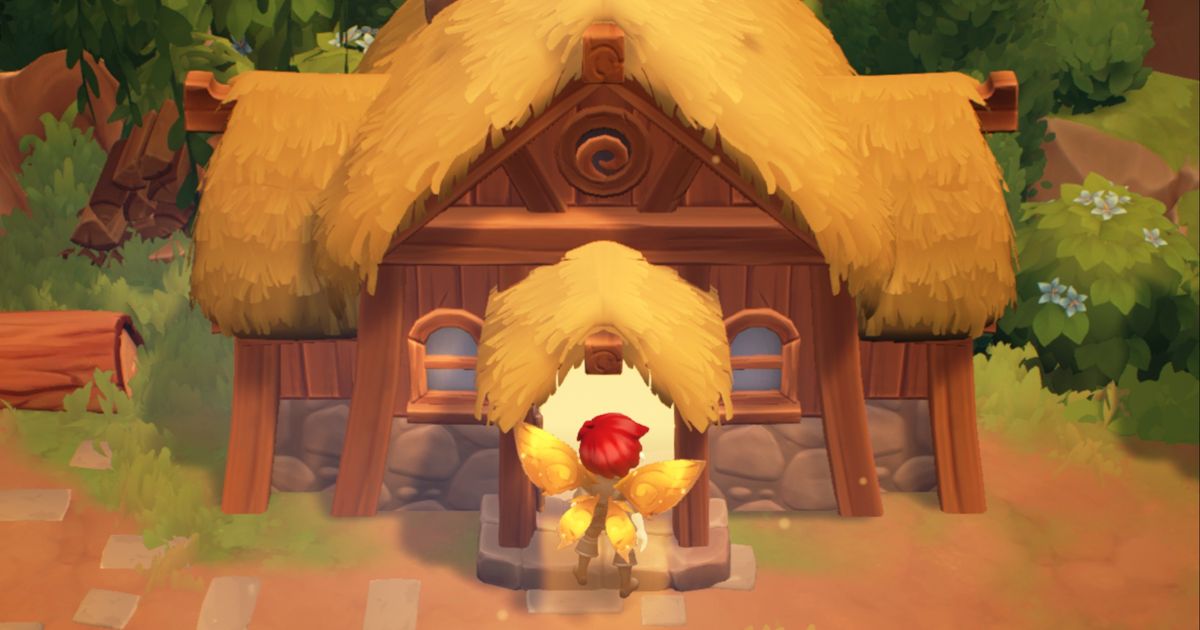 Fae Farm character stands at the door to their large house.