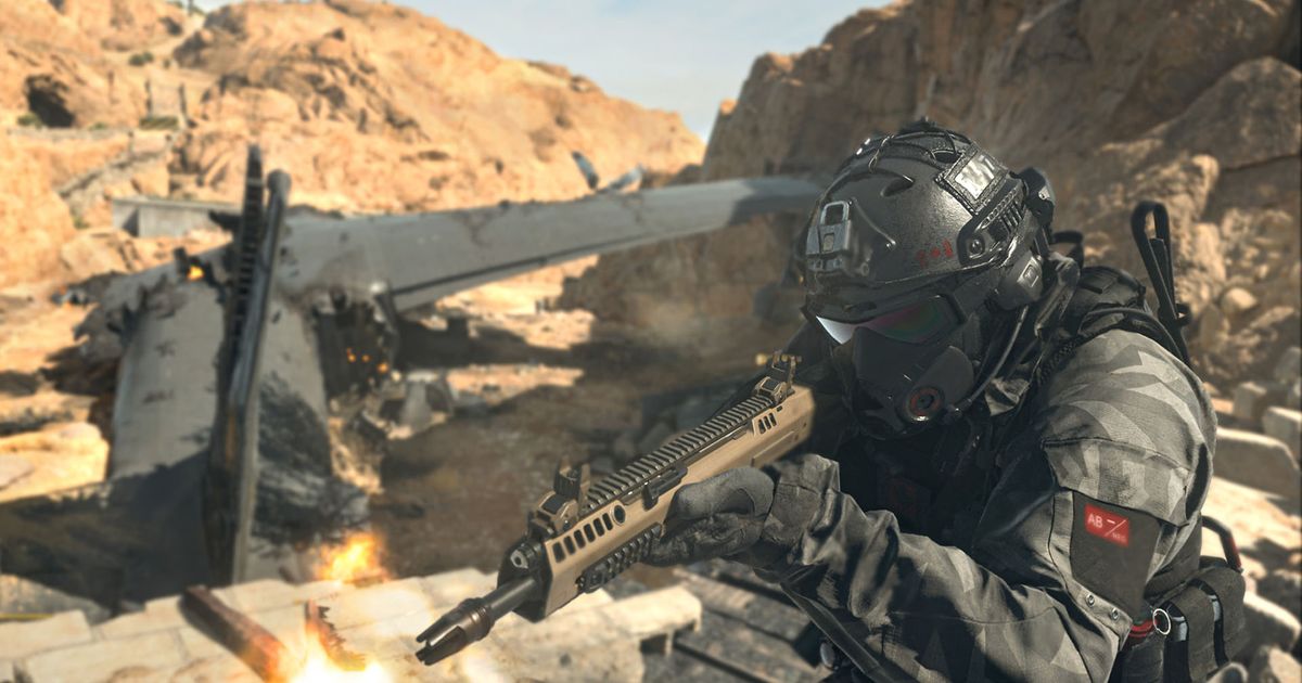 Modern Warfare 3 player firing gun with plane wreckage in background