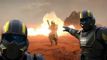 Helldivers 2 player pointing at player emerging from flames