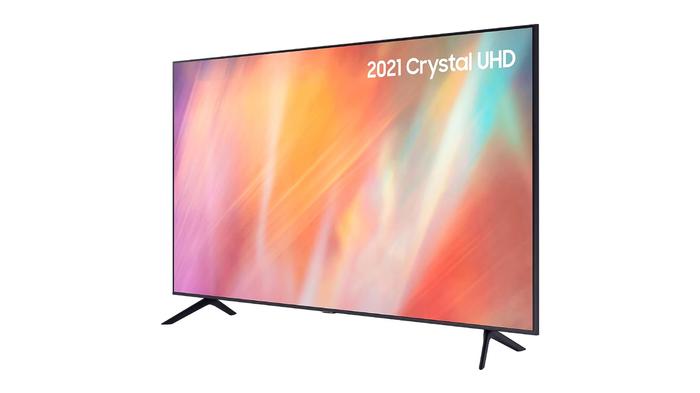 Best cheap 4K TV - Samsung AU7100 product image of a thin black-framed TV with a light pink, purple, orange, and light blue pattern on the display.