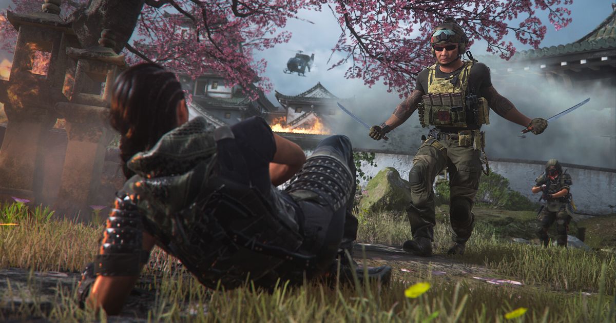 Screenshot showing downed Warzone 2 player laying on ground with Warzone 2 player carrying two swords in the background