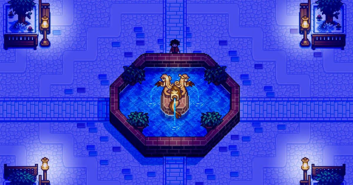 A large mermaid fountain in the middle of a town square lit by street lamps, from the game Haunted Chocolatier