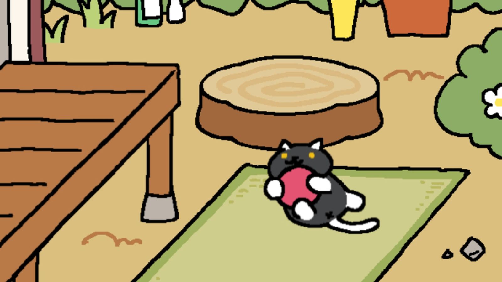 Screenshot from Neko Atsume, showing a black cat playing with a rubber ball