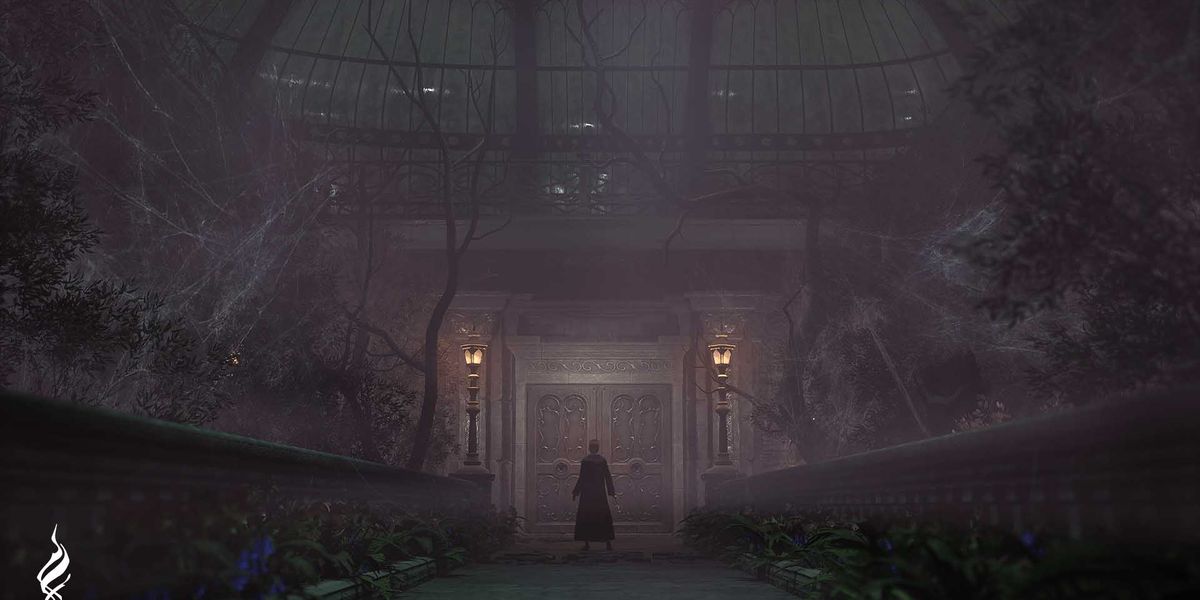A Hogwarts Legacy character walking through a dark outside corridor.