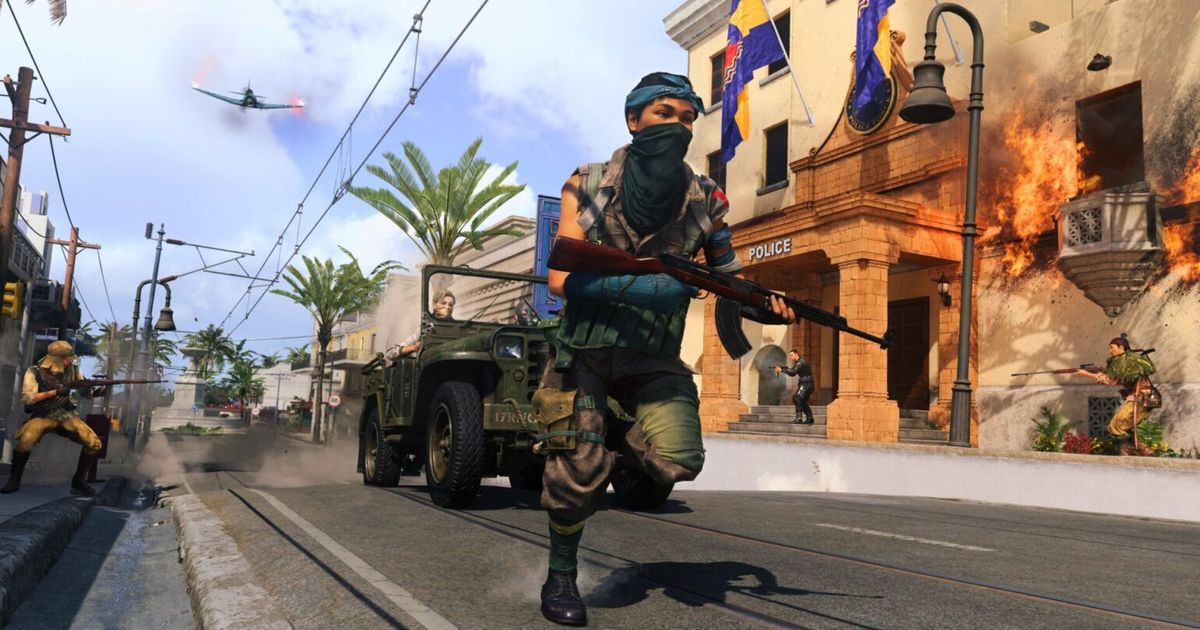 Image showing Warzone player running down street ahead of truck