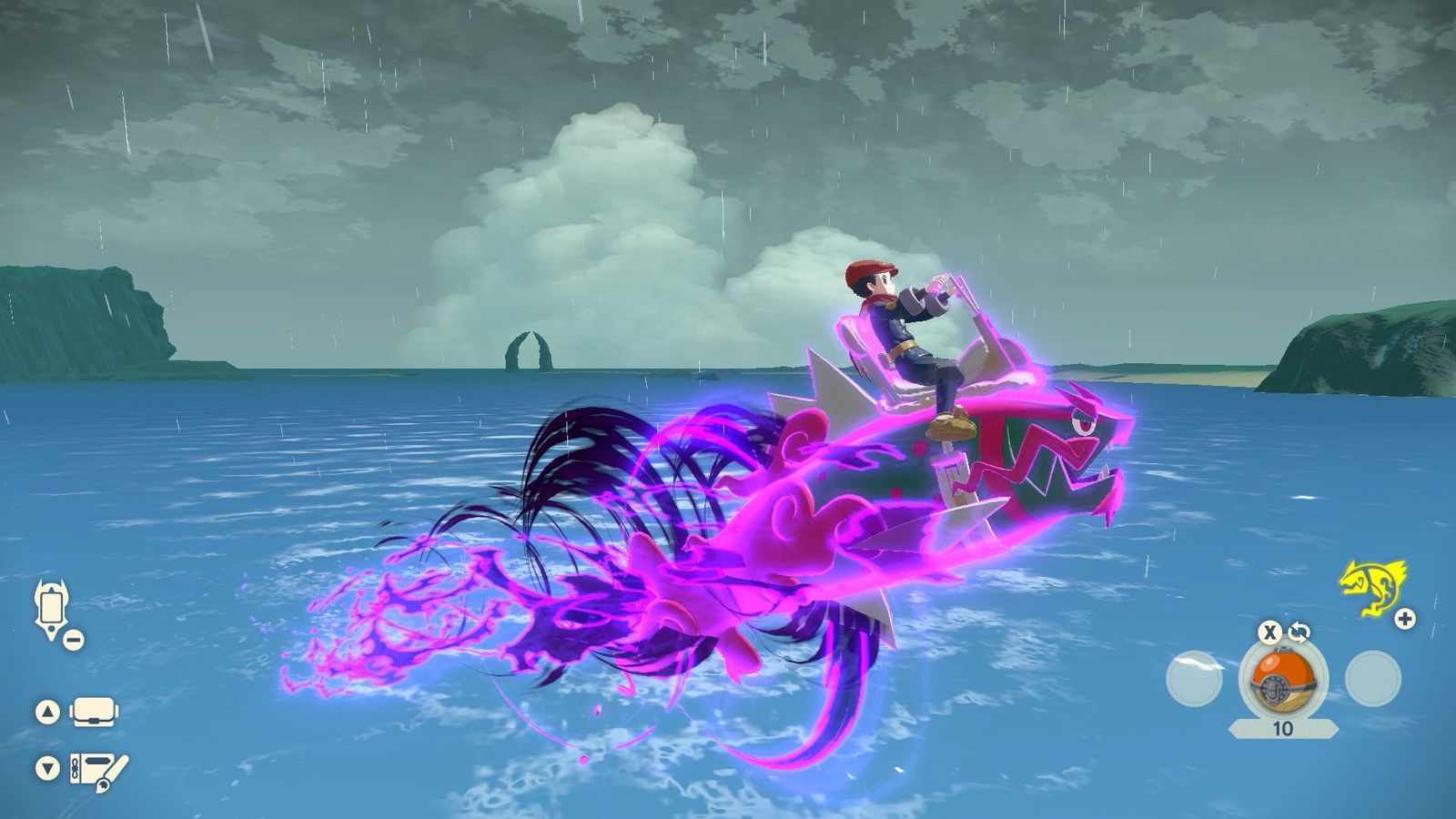 A Pokémon trainer rides a Basculegion that is glowing with purple flames.