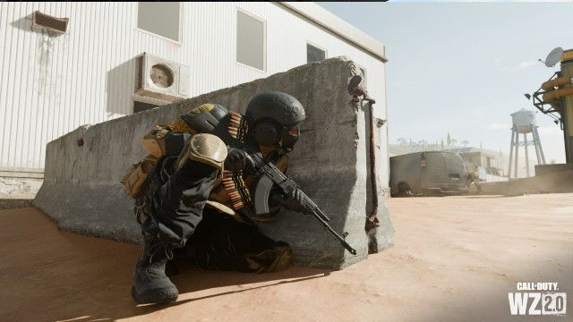 Warzone 2 player taking cover behind concrete