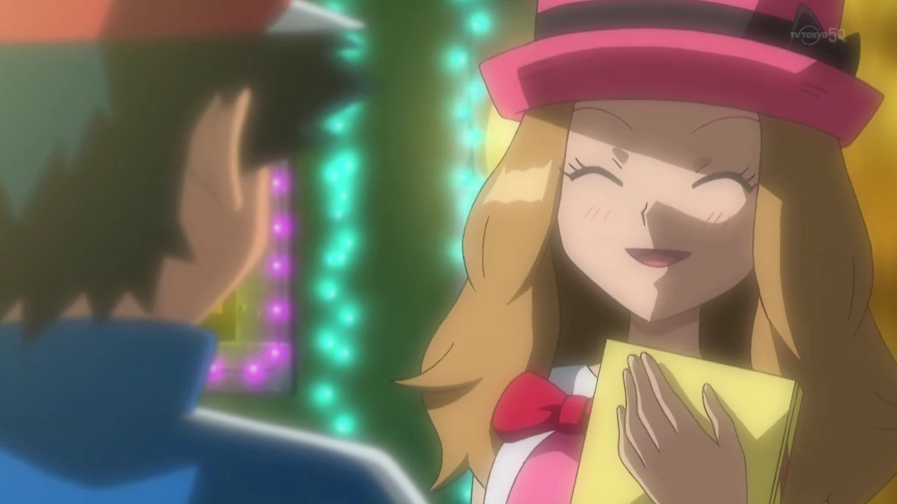 Serena, a childhood friend of Ash, and a travel companion, accepting a gift from him.