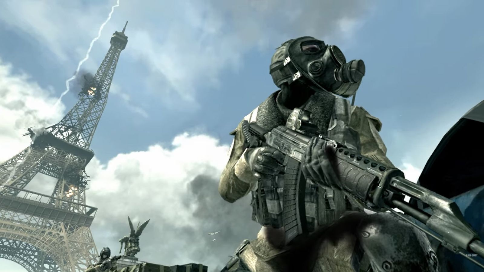 Modern Warfare 3 player holding gun with Eiffel Tower in background
