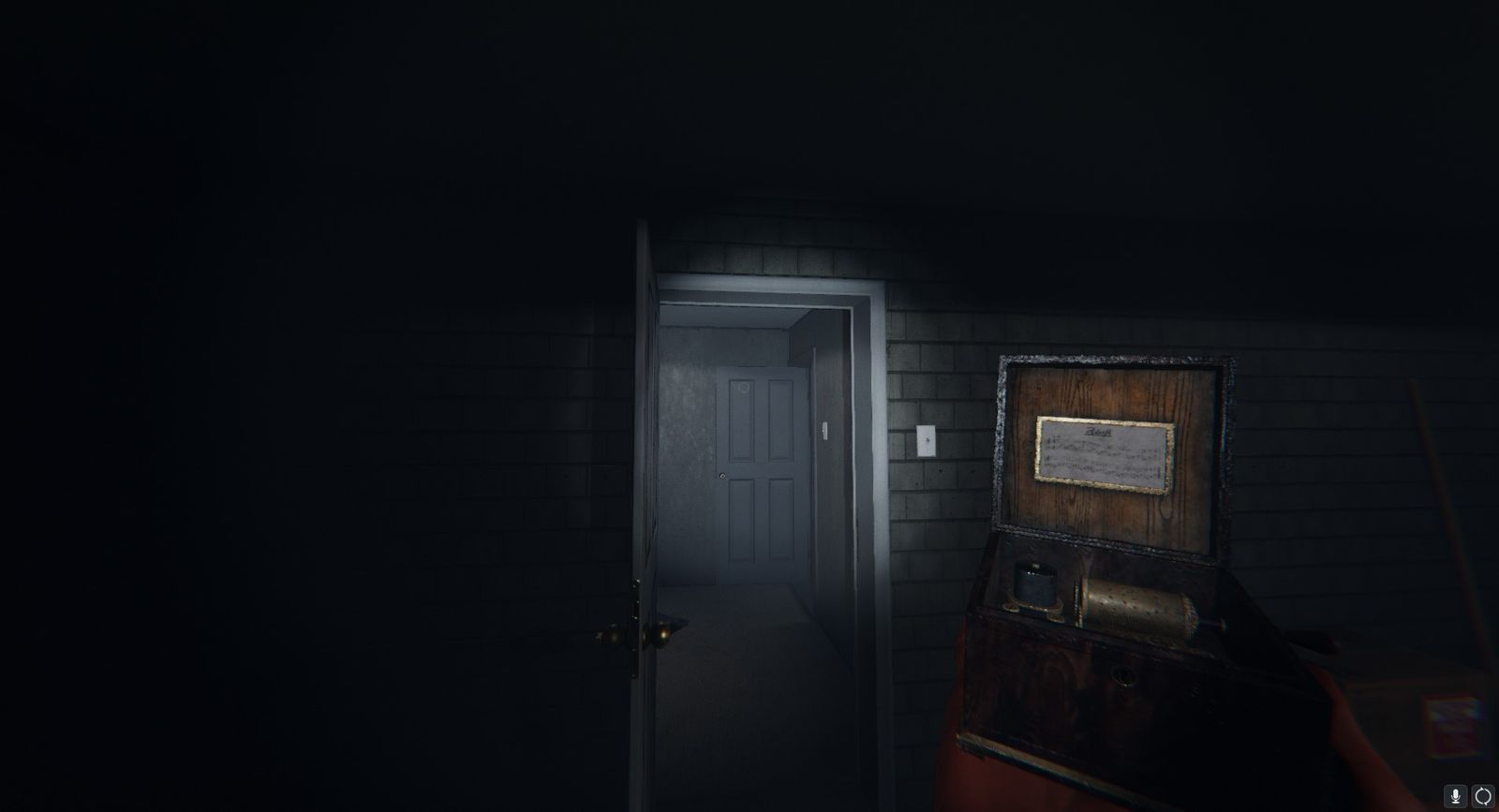 The Music Box, one of six Cursed Possessions, is held by the player in the garage of a house in Phasmophobia.