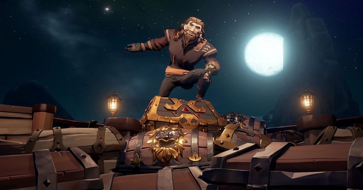 sea of thieves ach laden standing over lots of treasure chests buried in pile