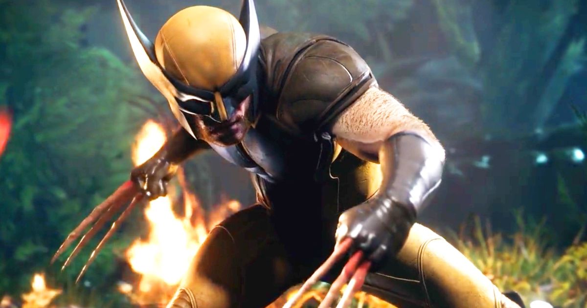 PS5 wolverine in his iconic yellow and blue suit standing in front of a fire donning bone claws 