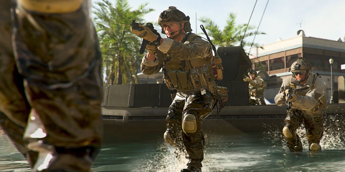 Image showing Modern Warfare 2 players walking through water near boat