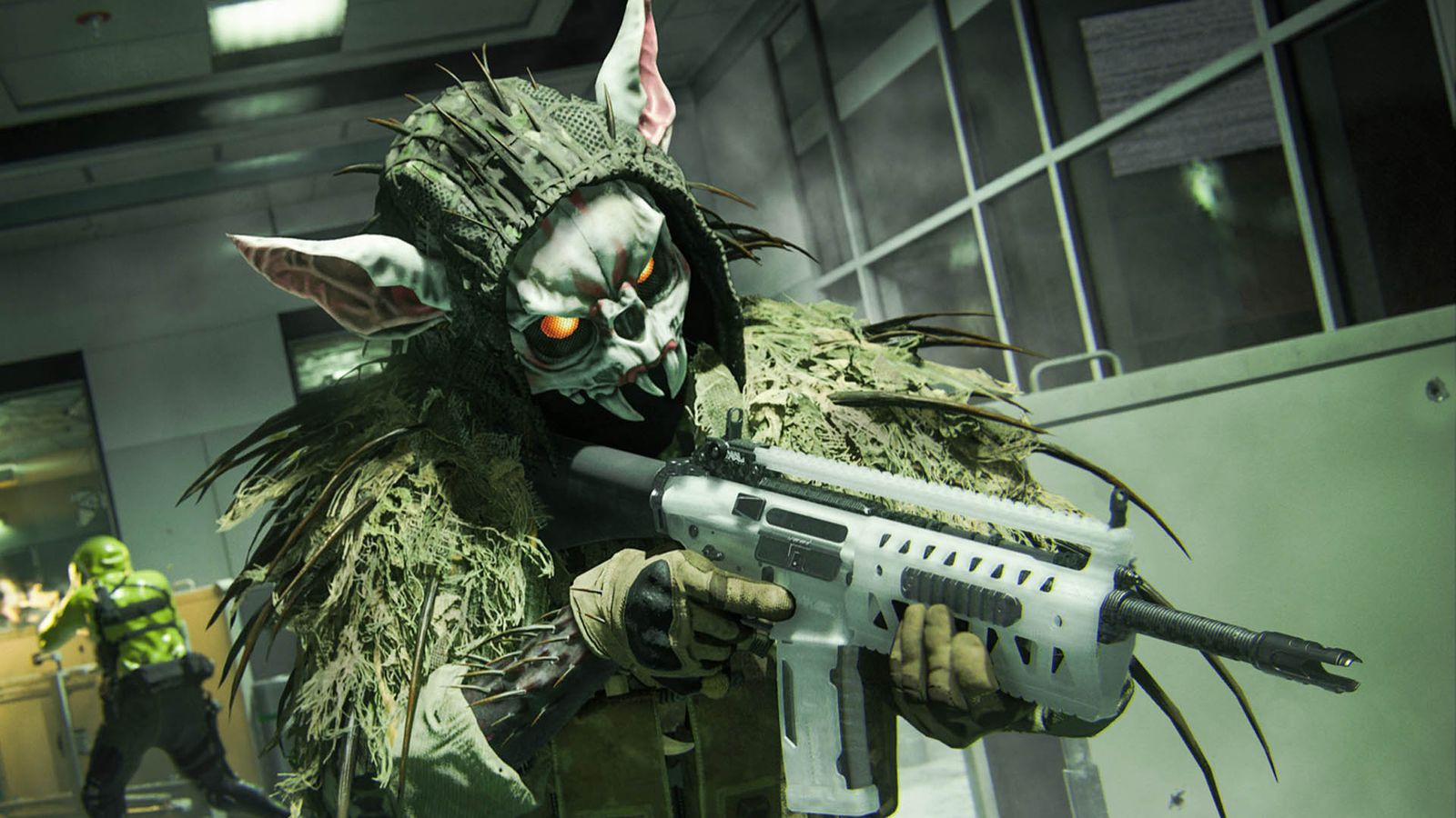 Warzone player holding SMG while wearing spooky rabbit mask