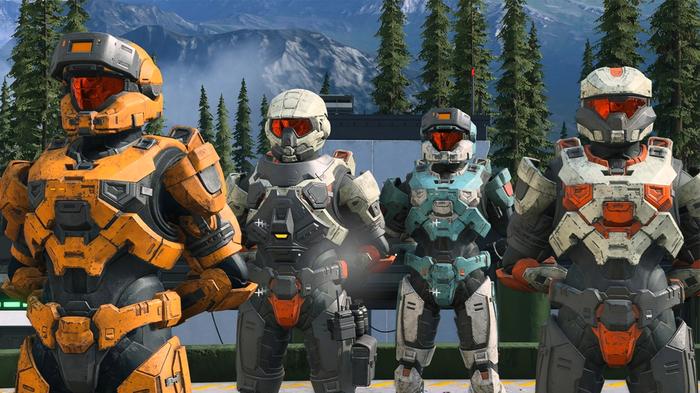 Four Spartan soldiers are stood side by side.