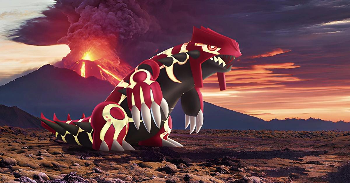 Pokemon Go - large red, gold, and black lizard pokemon (Groudon) in front of an erupting volcano.