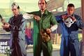 GTA 5 Blitz Play Official Art. Michael, Trevor and Franklin are all wearing boiler suits while holding different masks.