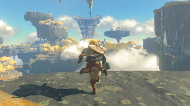 Link running toward flying islands in Zeld: Tears of the Kingdom.