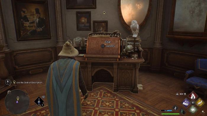 The player character approaching the Desk of Description in Hogwarts Legacy.