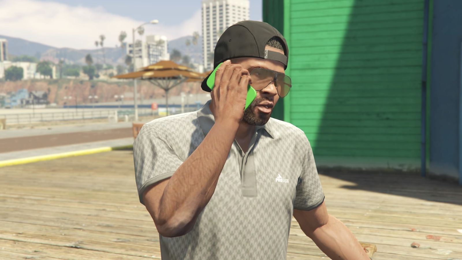 GTA Online The Contract DLC Franklin is talking on the phone on Del Pierro Pier. 