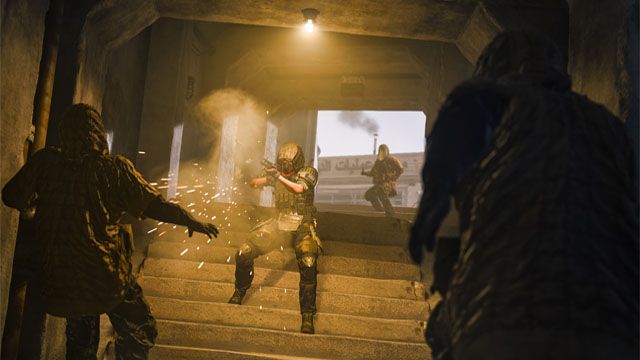 Warzone 2 player using shotgun in dark staircase