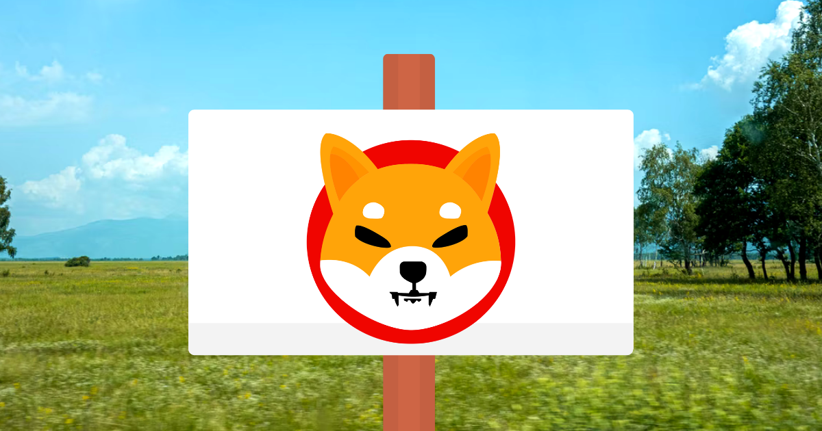 Shiba Inu logo on a for sale sign behind field