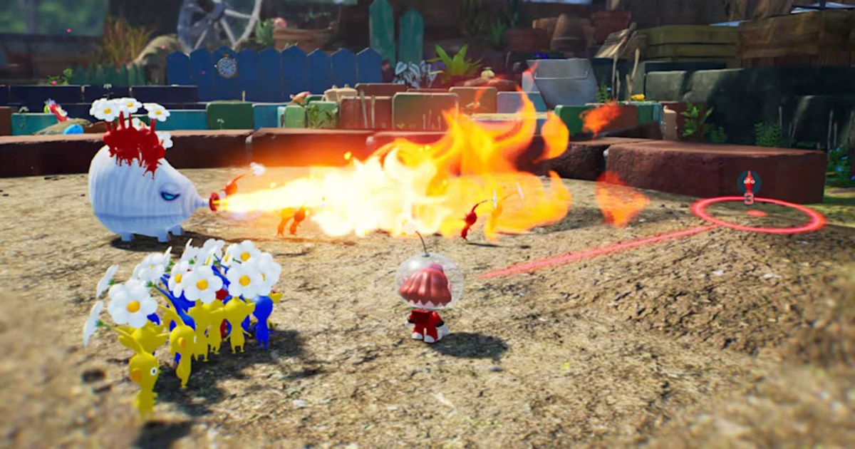 A group of Pikmin fighting a fire enemy in Pikmin 4.