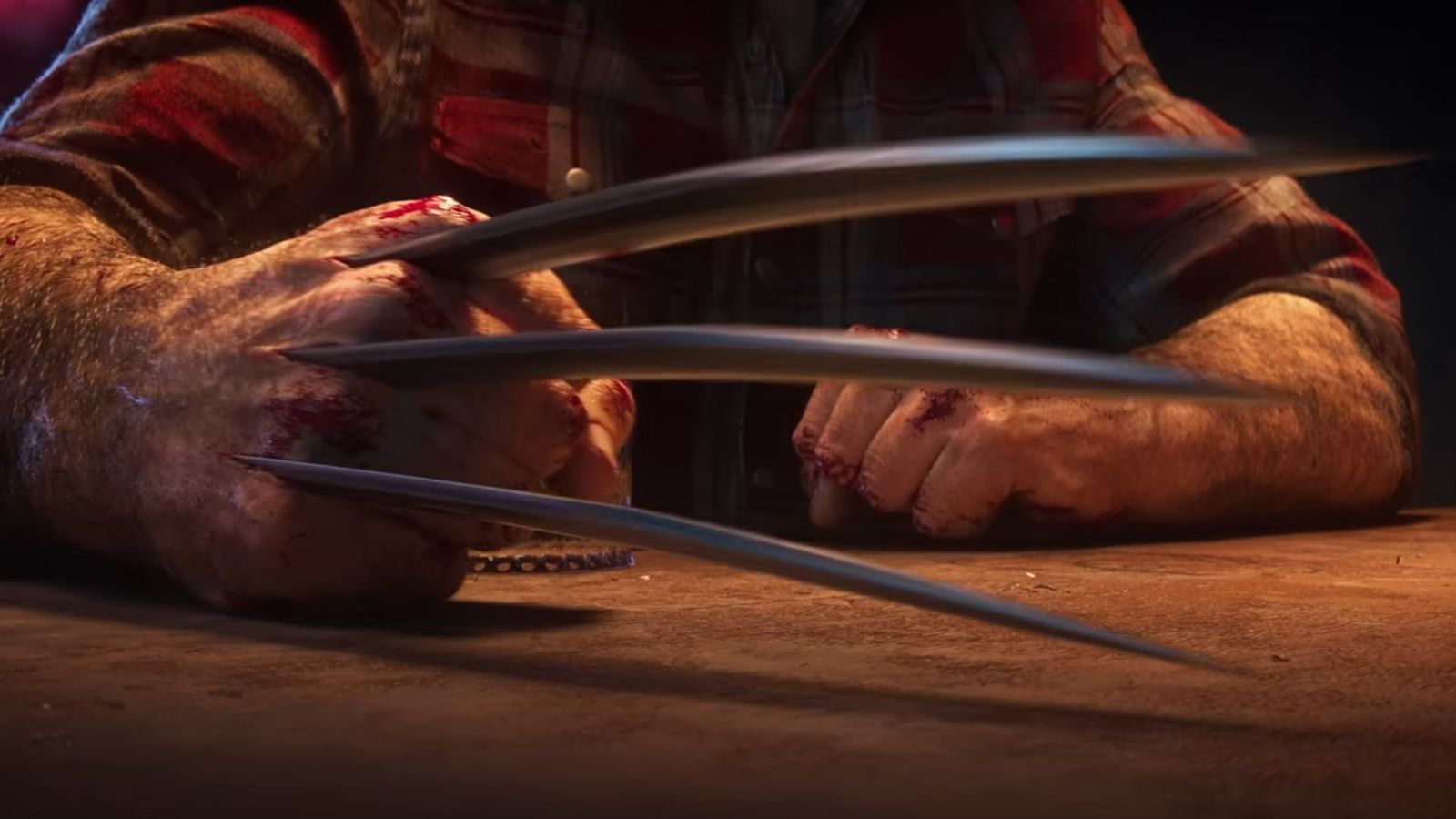 Wolverine's bloody hand with claws protruding