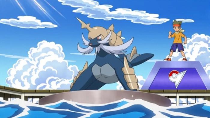 Samurott stands ready for battle on a platform floating in the sea.