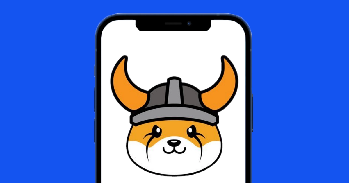 Floki Inu logo on a phone, for an article about a listing on Coinbase.