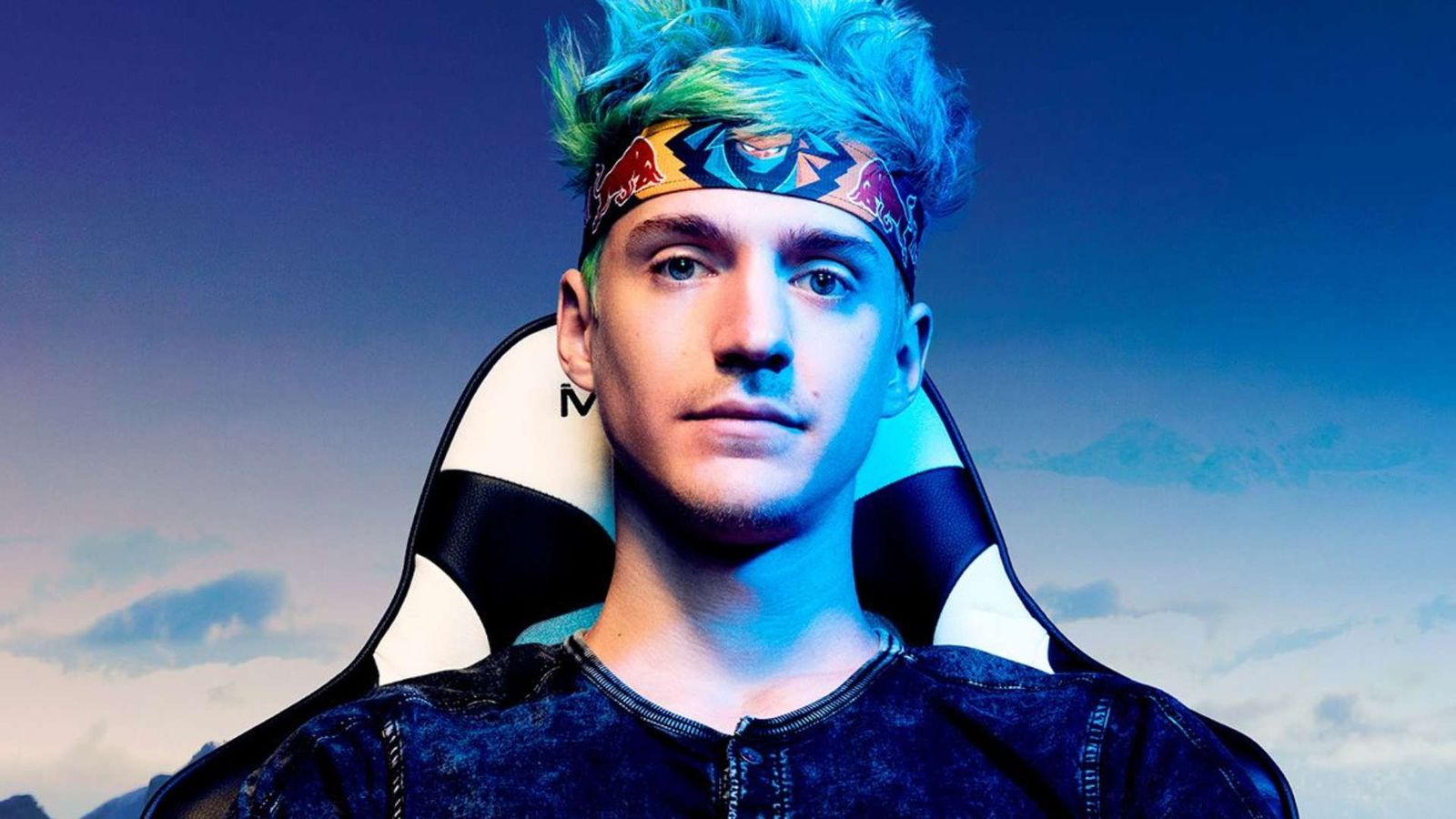 A profile shot of Ninja sitting on a gaming chair