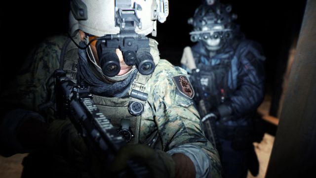 Image showing Modern Warfare 2 players moving through dark room