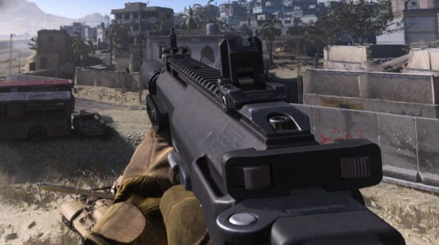 Image showing Warzone player holding MP7 submachine gun