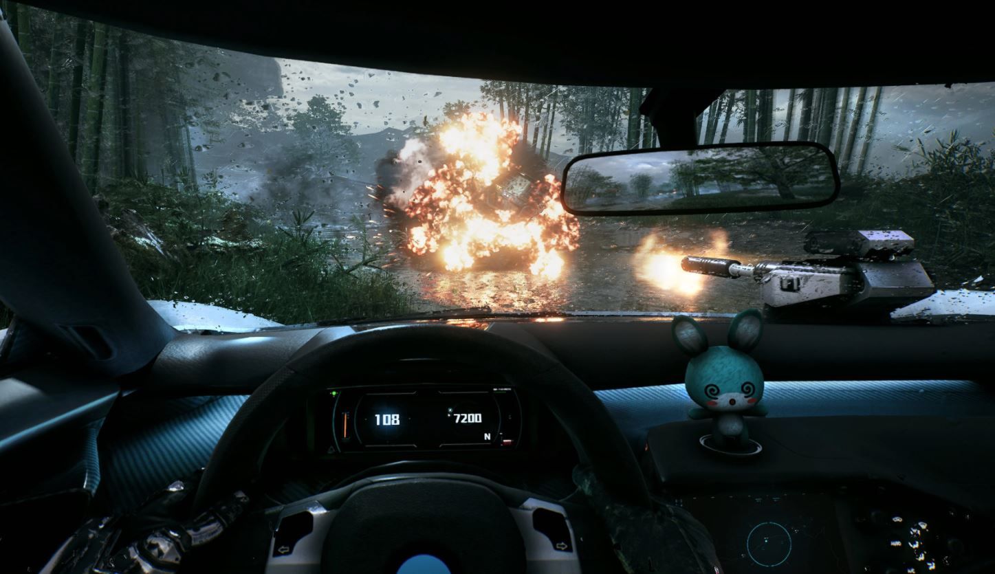The image shows the player in a car, with an explosion in front of them.