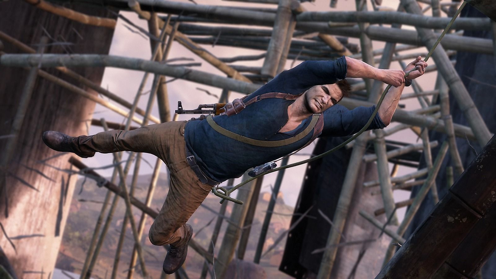 An image of Nathan swinging from a vine in Uncharted 4. 