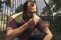 GTA Online - man crouched down next to a fence, eating a peyote plant
