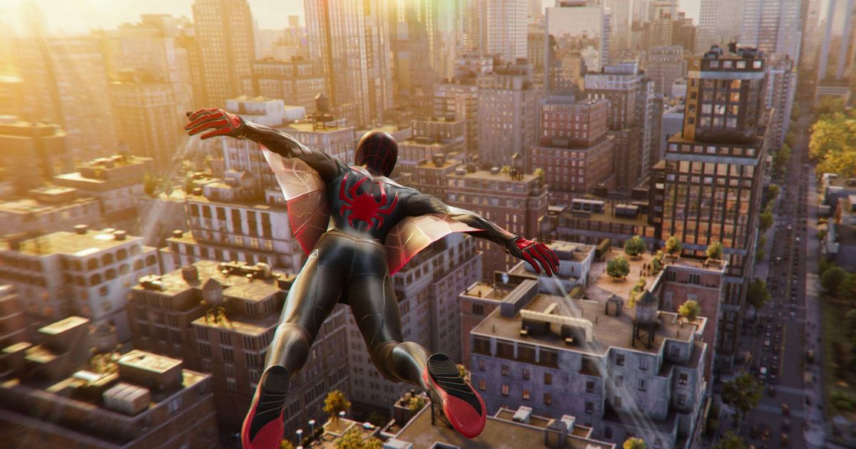 Miles Morales wing-gliding across New York in Spider-Man 2.