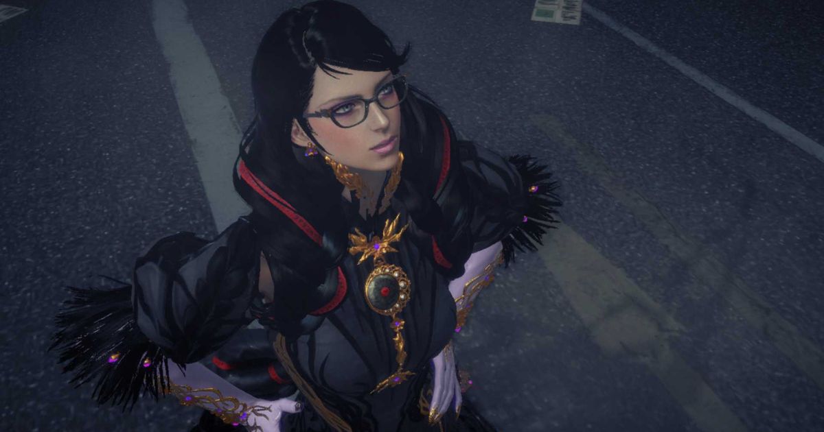 Bayonetta looking upwards with her hands on her hips.