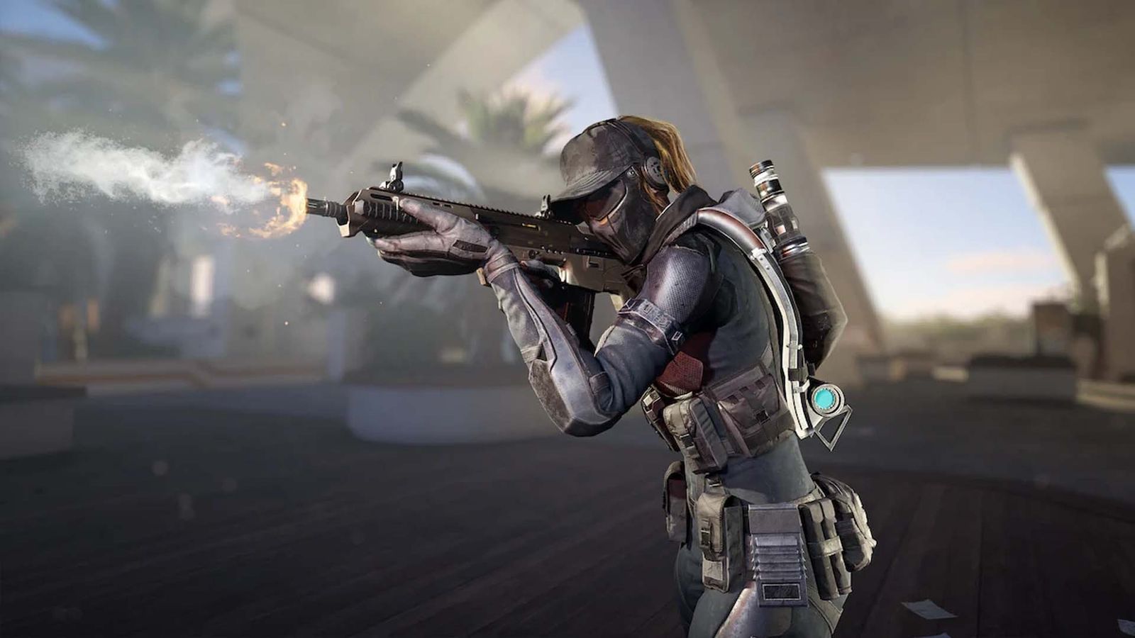 Screenshot of XDefiant player firing assault rifle and aiming down sights with blue sky and a palm tree in the background