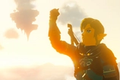 Link holding up his arm in Tears of the Kingdom