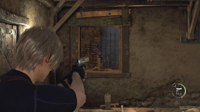 Leon aiming his pistol through a window in Resident Evil 4 remake.