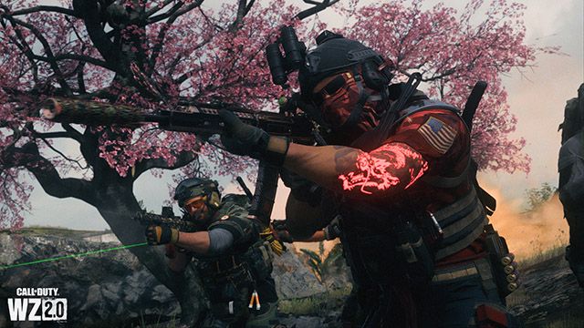 Screenshot showing Warzone 2 players aiming with guns
