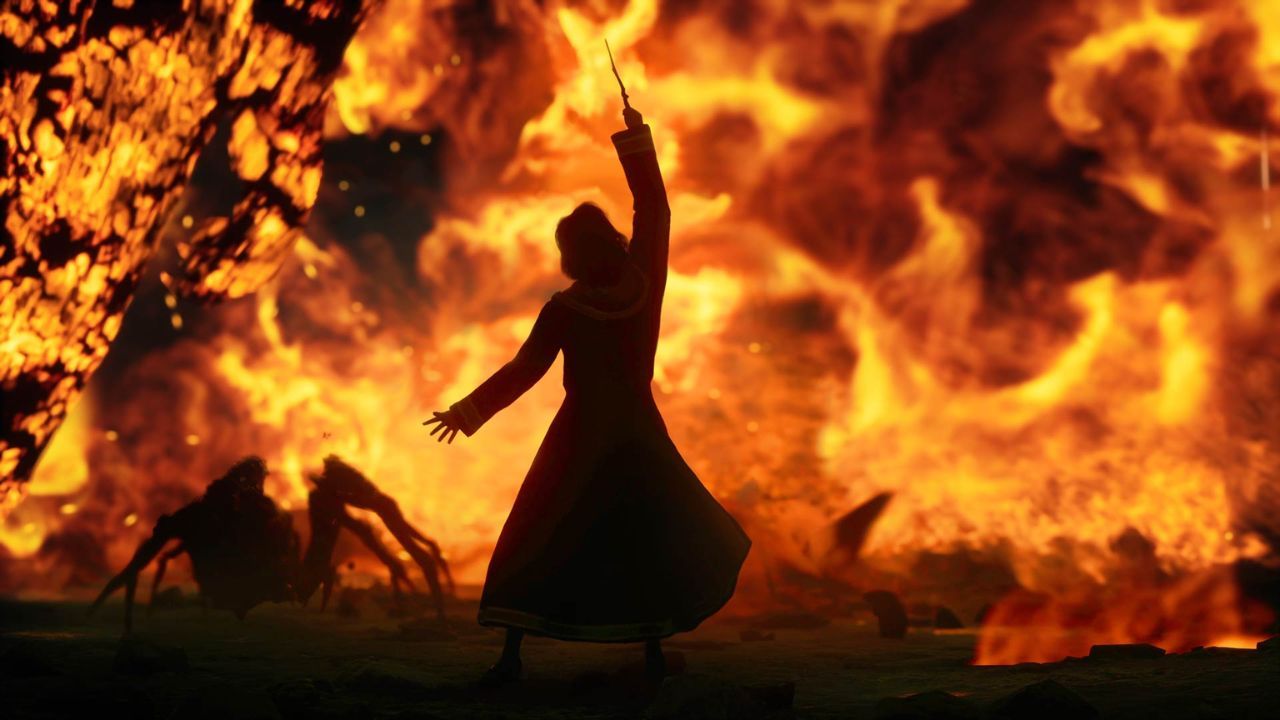 A character casting a spell against a fiery backdrop in Hogwarts Legacy.