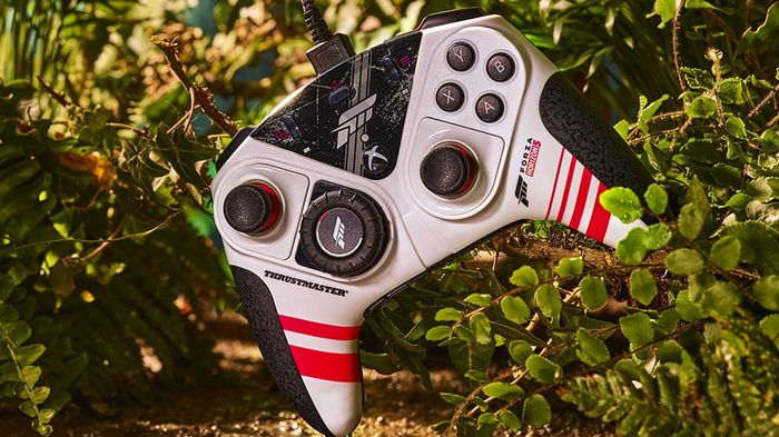 The Thrustmaster ESWAP XR Pro Controller Forza Horizon 5 edition hidden within some bushes.